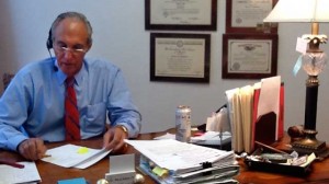 Glenn R. Roderman discussing a case with a client.