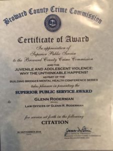 Award to Glenn in connection with juvenile cases