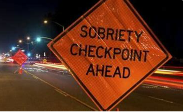 sobriety checkpoint ahead sign